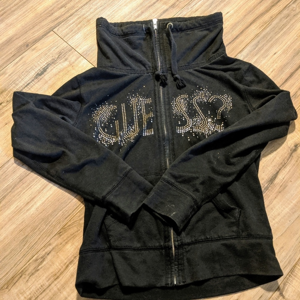 Guess black zip up jacket. No hood.